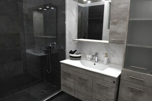 Hair dryer, towels, soap, toilet paper