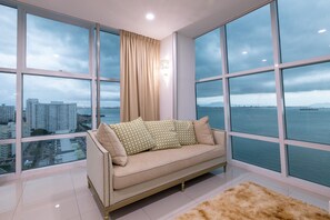 Luxury Condo | Living area | 45-inch Smart TV with digital channels, Netflix, streaming services