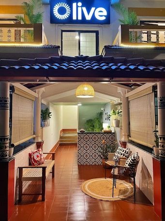 Front of property - evening/night. Olive Hotel Calangute Niwasa by Embassy Group