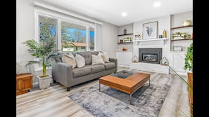 House, 4 Bedrooms, Patio | Living room | Books - Minne-getaway, Designer Stay South Of The River (Apple Valley)