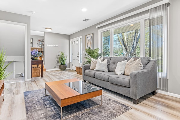 House, 4 Bedrooms, Patio | Living room | Books - Minne-getaway, Designer Stay South Of The River (Apple Valley)