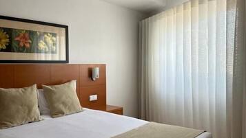 Single Standard Edition | Premium bedding, memory foam beds, in-room safe, individually decorated