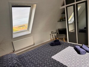4 bedrooms, desk, iron/ironing board, travel cot