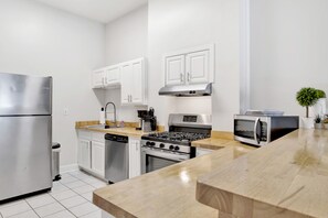 Fridge - Newly Renovated Downtown Apartment in Historic District, Quiet Street, Walkable
(Mobile)