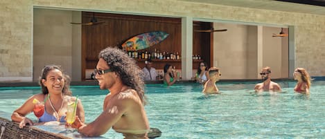 A pool area with clear water, a bar with bottles, and a wooden ceiling.