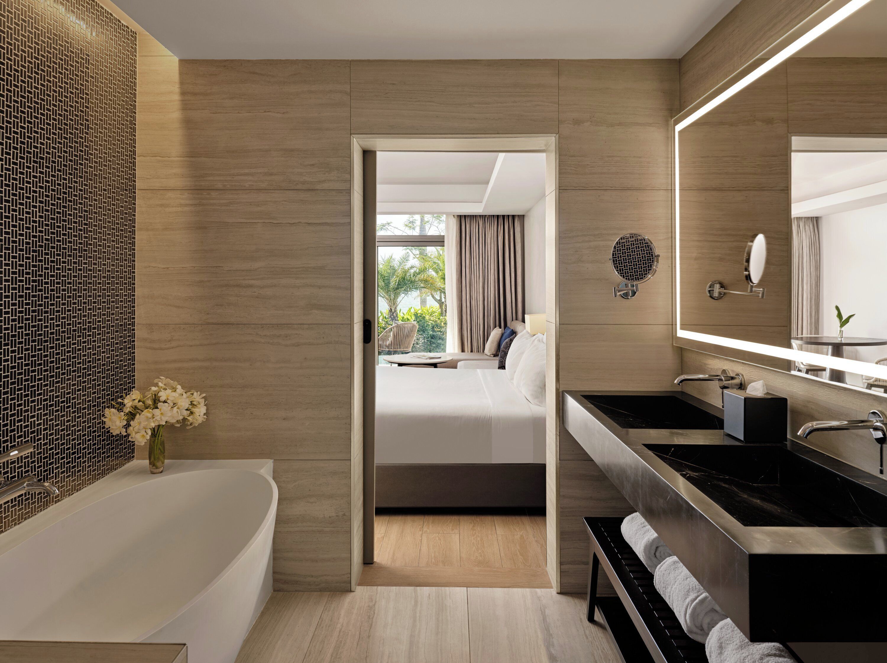 combined shower/bathtub, bathrobes, slippers, towels