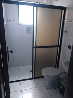 Shower, towels, toilet paper