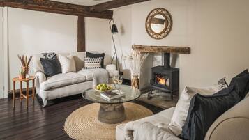 House, Multiple Beds | Living area | Fireplace