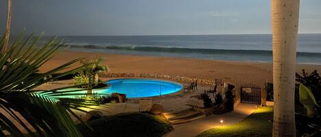 On the beach, sun loungers, beach towels