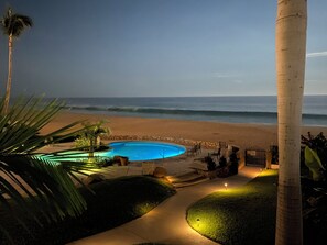 On the beach, sun-loungers, beach towels - Stunning Oceanfront Condo with Pool in Mira Vista (San José del Cabo)