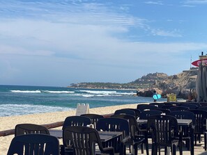 On the beach, sun-loungers, beach towels - Stunning Oceanfront Condo with Pool in Mira Vista (San José del Cabo)