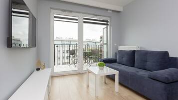 Apartemen, 1 kamar tidur, balkon | Ruang keluarga