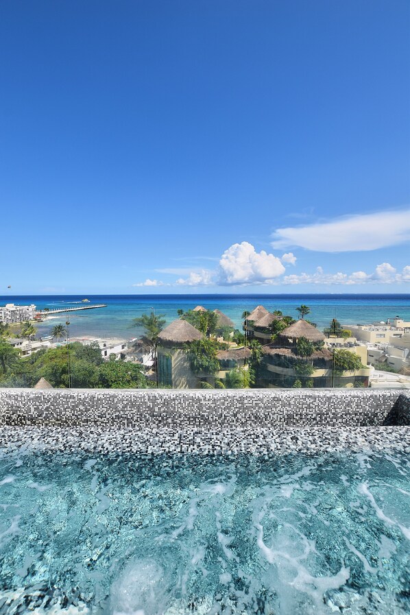 Outdoor pool, pool umbrellas - Centric condo by Casago (Playa del Carmen)