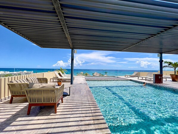 Outdoor pool, pool umbrellas - Centric condo by Casago (Playa del Carmen)