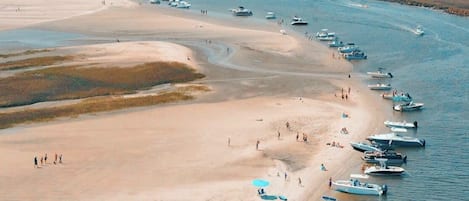 On the beach, sun-loungers, beach towels