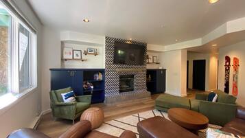 Smart TV, fireplace, books