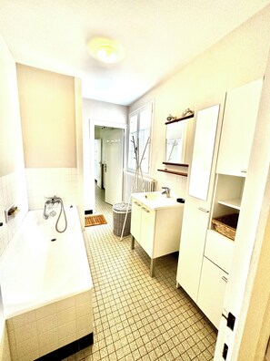 Hair dryer, towels, soap, shampoo