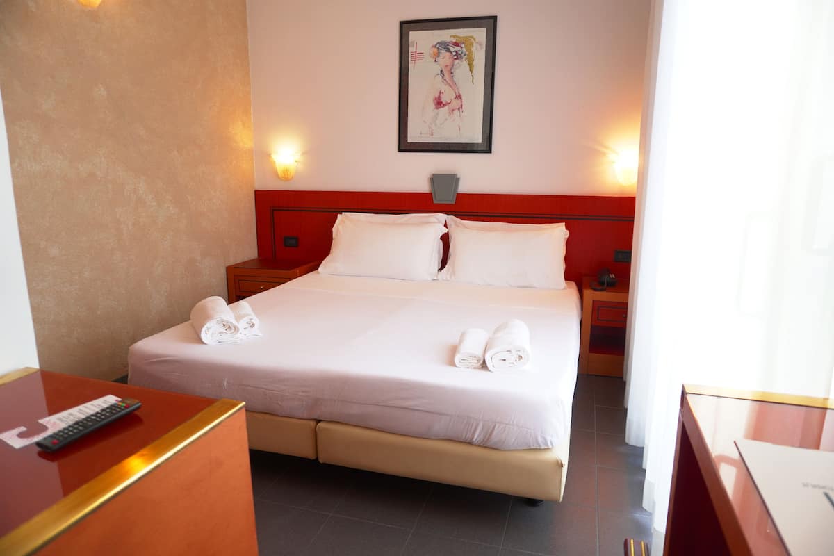 Chambre Standard | Literie de qualité, minibar, bureau