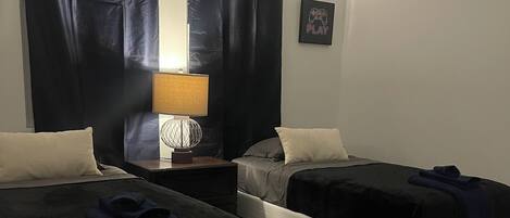 3 chambres, coffre-fort, fer et planche à repasser, lit de bébé portatif