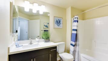 Hair dryer, towels, soap, shampoo