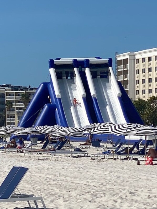 On the beach, sun loungers, beach towels
