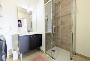 Shower, towels, soap, shampoo