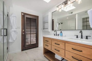 Shower, eco-friendly toiletries, hair dryer, towels