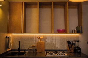 Fridge, microwave, stovetop, coffee/tea maker