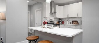 Charming 4 Bedroom Home Near Downtown Columbus with Garage Parking and Backyard.