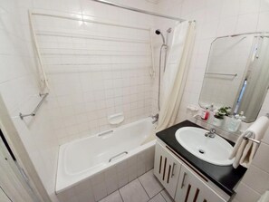 Hair dryer, towels, soap, toilet paper