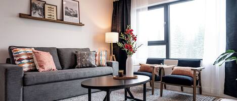 Condo | Living area | 40-inch flat-screen TV with digital channels