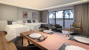 A hotel room with two beds, a dining area with a table set for two, and a view of palm trees and buildings through large windows. - Hotel Flat Afonso Pena by FGibran (Campo Grande)