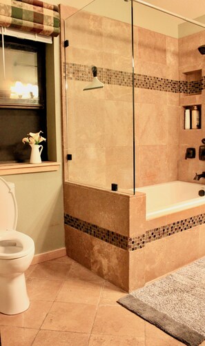 Shower, hair dryer, towels, soap