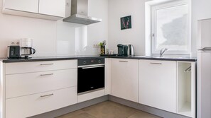 Geladeira, fogão, cooktop, lava-louças