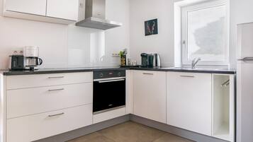 Réfrigérateur, four, plaque de cuisson, lave-vaisselle