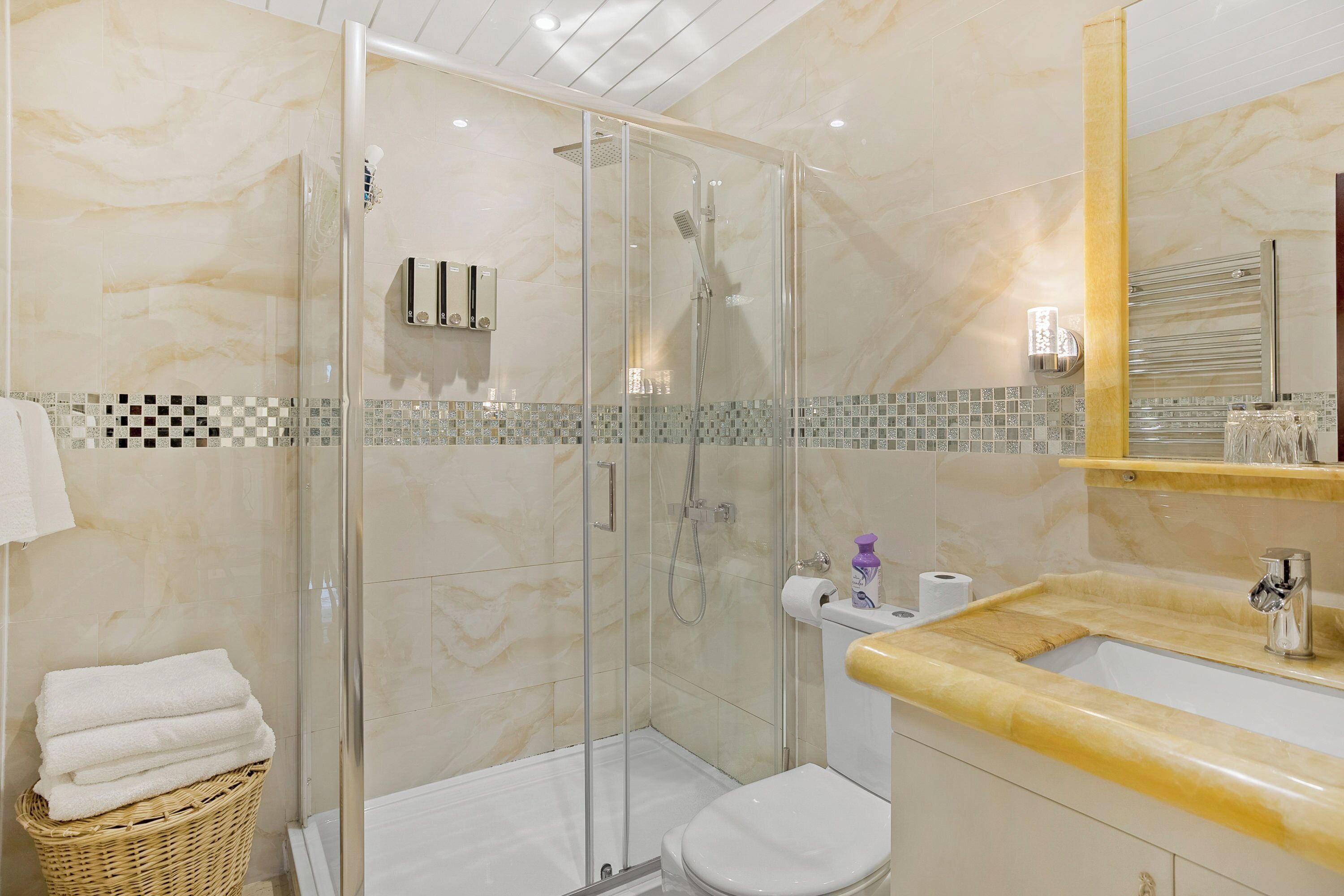 Shower, eco-friendly toiletries, hair dryer, towels