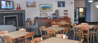 Hotel room with ONE QUEEN BED and attached, private bathroom. 