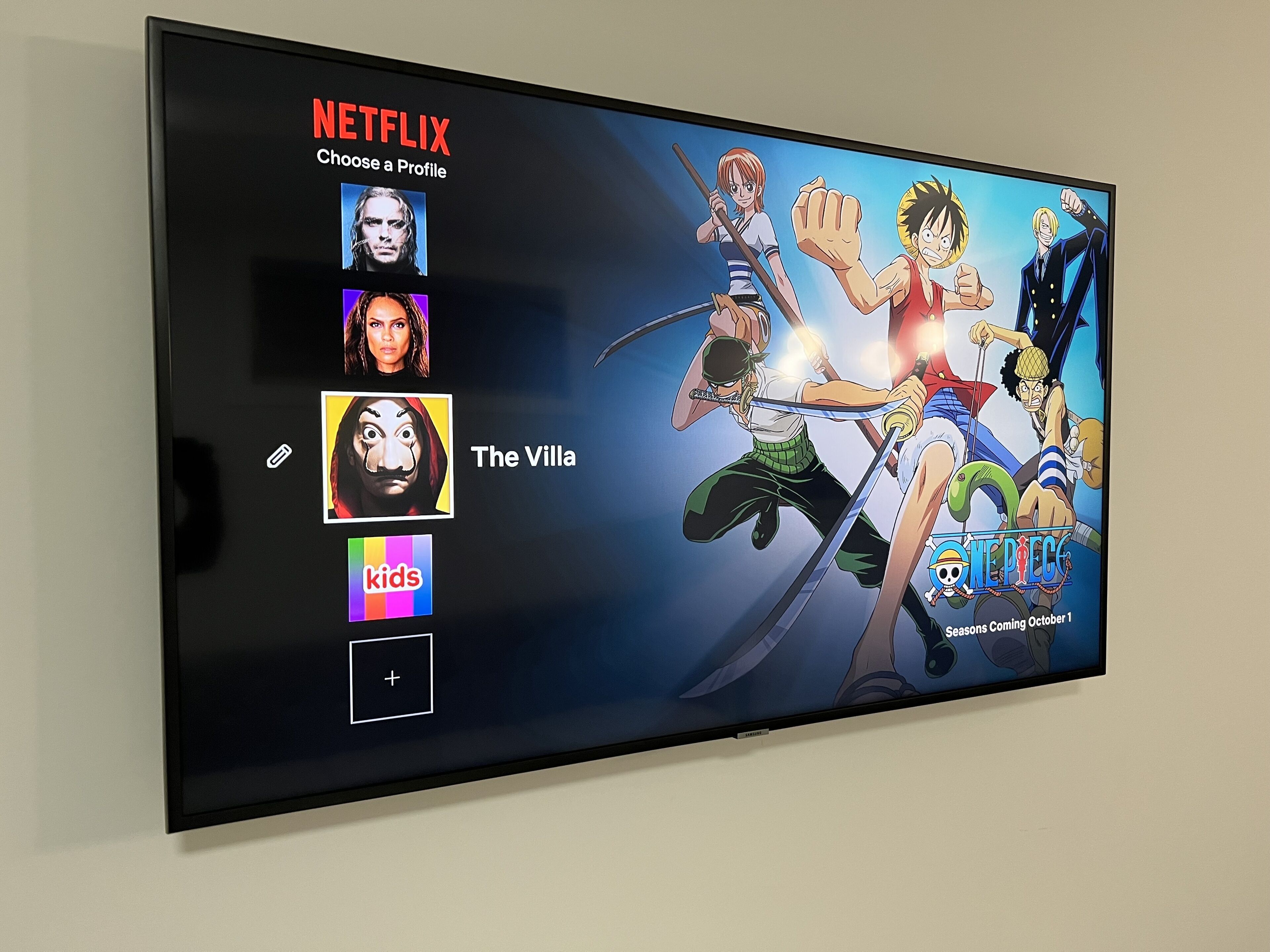 A television screen displaying a Netflix interface with 'The Villa' highlighted, indicating a selection of anime content.