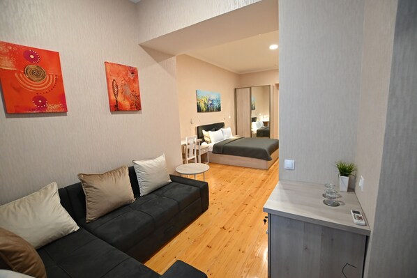 Familienzimmer | Wohnbereich | Flachbildfernseher