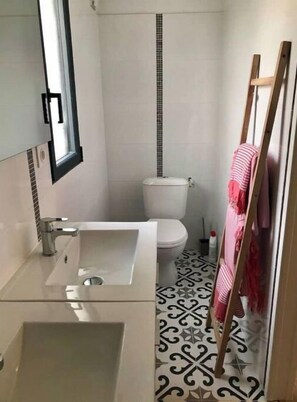Hair dryer, towels, soap, toilet paper
