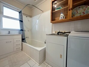 Shower, hair dryer, towels