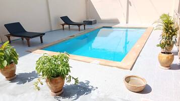 Outdoor pool, pool loungers