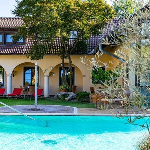 Indoor pool, outdoor pool, open 7:00 AM to 9:00 PM, pool umbrellas