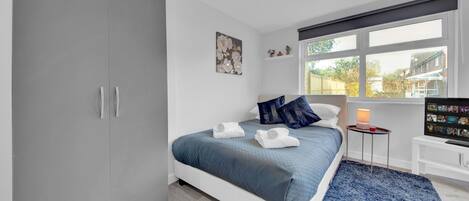 Estudio | Tabla de planchar con plancha, wifi gratis y ropa de cama