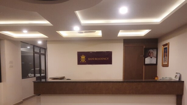 A reception desk with a sign reading "RANI RESIDENCY". - Rani Residency (Nagercoil)