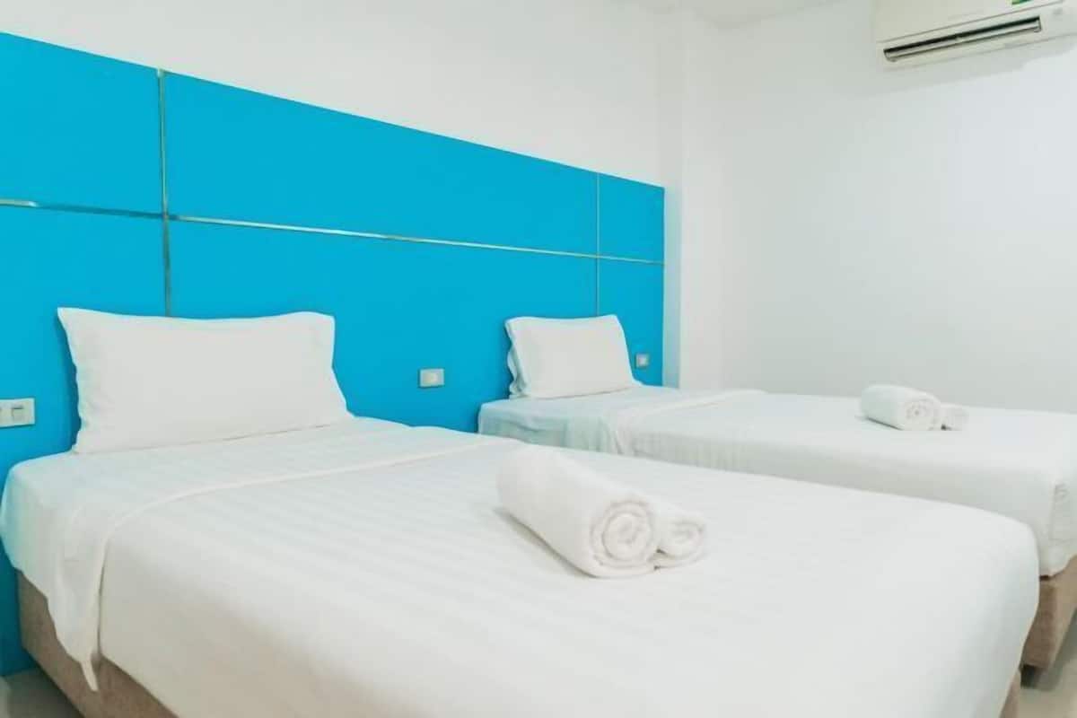 In-room safe, blackout drapes, WiFi (free), bed sheets