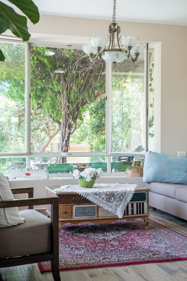 Villa | Living area | 50-inch Smart TV with cable channels