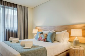 Premium bedding, down duvets, blackout curtains, soundproofing