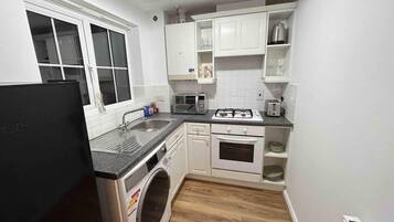 Apartment | Private kitchen | Fridge, microwave, oven, stovetop