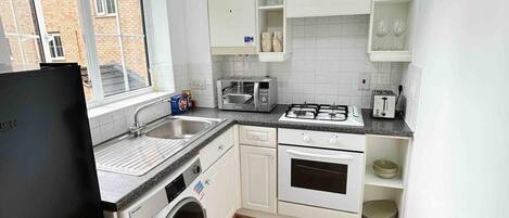 Apartment | Private kitchen | Fridge, microwave, oven, stovetop